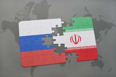 bir dünya haritası arka plan üzerinde Rusya ve İran ulusal bayrağı ile bulmaca.