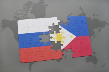 bir dünya haritası arka plan üzerinde Rusya ve Filipinler ulusal bayrağı ile bulmaca.