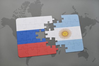 bir dünya haritası arka plan üzerinde Rusya ve Arjantin ulusal bayrağı ile bulmaca.