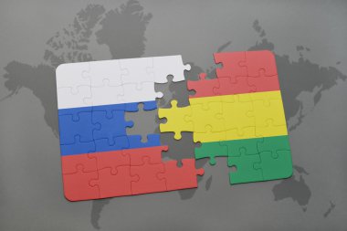 bir dünya haritası arka plan üzerinde Rusya ve Bolivya ulusal bayrağı ile bulmaca.