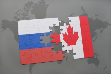 bir dünya haritası arka plan üzerinde Rusya ve Kanada ulusal bayrağı ile bulmaca.
