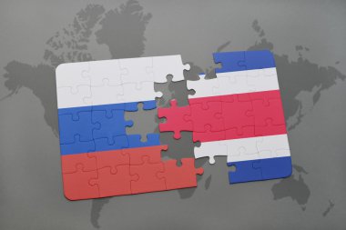 bir dünya haritası arka plan üzerinde Rusya ve Kosta Rika ulusal bayrağı ile bulmaca.