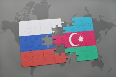 bir dünya haritası arka plan üzerinde Rusya ve Azerbaycan ulusal bayrağı ile bulmaca.