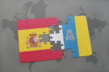 bir dünya haritası arka plan üzerinde İspanya ve kanarya adalarıulusal bayrağı ile bulmaca.