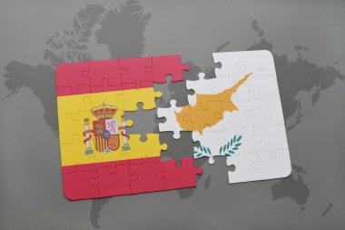 bir dünya haritası arka plan üzerinde İspanya ve Kıbrıs ulusal bayrağı ile bulmaca.