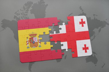 bir dünya haritası arka plan üzerinde İspanya ve Gürcistan ulusal bayrağı ile bulmaca.