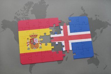 bir dünya haritası arka plan üzerinde İspanya ve İzlanda ulusal bayrağı ile bulmaca.