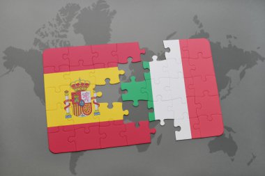 bir dünya haritası arka plan üzerinde İspanya ve İtalya ulusal bayrağı ile bulmaca.