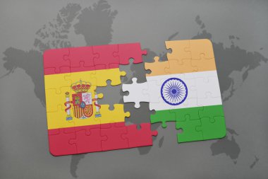 bir dünya haritası arka plan üzerinde İspanya ve Hindistan ulusal bayrağı ile bulmaca.