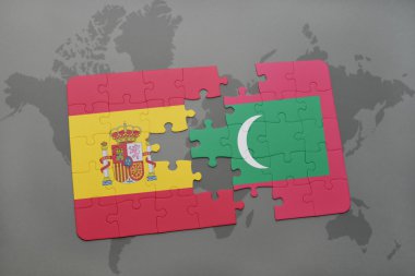 bir dünya haritası arka plan üzerinde İspanya ve Maldivler ulusal bayrağı ile bulmaca.
