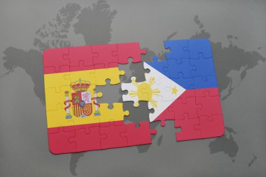 bir dünya haritası arka plan üzerinde İspanya ve Filipinler ulusal bayrağı ile bulmaca.