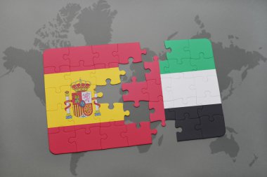 bir dünya haritası arka plan üzerinde İspanya ve birleşik arap emirlikleri ulusal bayrağı ile bulmaca.