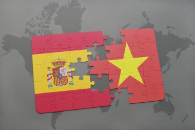 bir dünya haritası arka plan üzerinde İspanya ve Vietnam ulusal bayrağı ile bulmaca.