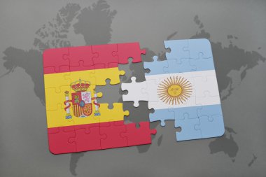 bir dünya haritası arka plan üzerinde İspanya ve Arjantin ulusal bayrağı ile bulmaca.