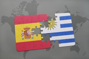 bir dünya haritası arka plan üzerinde İspanya ve Uruguay ulusal bayrağı ile bulmaca.