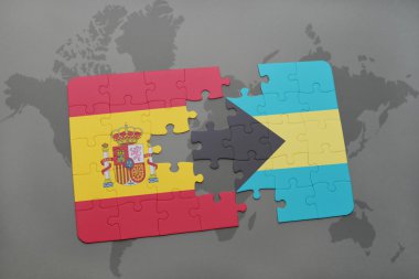 bir dünya haritası arka plan üzerinde İspanya ve Bahamalar ulusal bayrağı ile bulmaca.