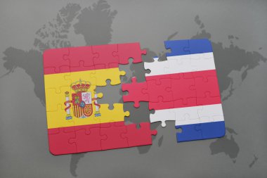 bir dünya haritası arka plan üzerinde İspanya ve Kosta Rika ulusal bayrağı ile bulmaca.