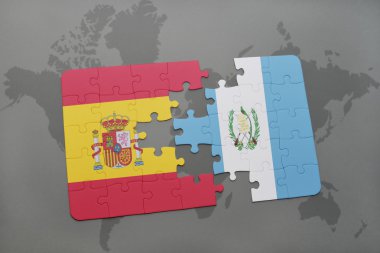 bir dünya haritası arka plan üzerinde İspanya ve Guatemala ulusal bayrağı ile bulmaca.