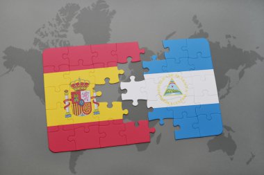 bir dünya haritası arka plan üzerinde İspanya ve nikaragua ulusal bayrağı ile bulmaca.