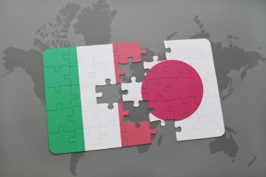 bir dünya haritası arka plan üzerinde İtalya ve Japonya ulusal bayrağı ile bulmaca.