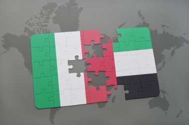 puzzle with the national flag of italy and united arab emirates on a world map background.