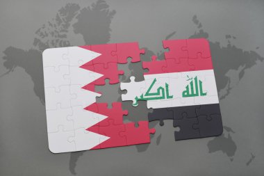 bir dünya haritası arka plan üzerinde bahreyn ve Irak ulusal bayrağı ile bulmaca.