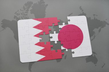 bir dünya haritası arka plan üzerinde bahreyn ve Japonya ulusal bayrağı ile bulmaca.