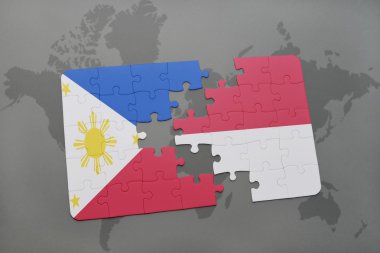 bir dünya haritası arka plan üzerinde Filipinler ve Endonezya ulusal bayrağı ile bulmaca.