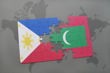 bir dünya haritası arka plan üzerinde Filipinler ve Maldivler ulusal bayrağı ile bulmaca.