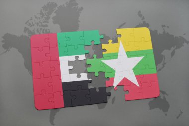 bir dünya haritası arka plan üzerinde birleşik arap emirlikleri ve myanmar ulusal bayrağı ile bulmaca.