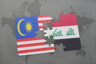 bir dünya haritası arka plan üzerinde Malezya ve Irak ulusal bayrağı ile bulmaca.
