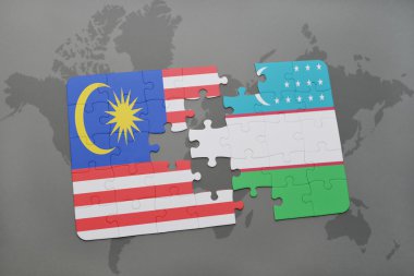 bir dünya haritası arka plan üzerinde malezya ve özbekistan ulusal bayrağı ile bulmaca.