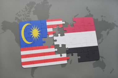 bir dünya haritası arka plan üzerinde Malezya ve Yemen ulusal bayrağı ile bulmaca.