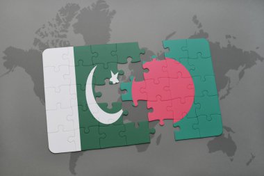 bir dünya haritası arka plan üzerinde pakistan ve bangladeş ulusal bayrağı ile bulmaca.
