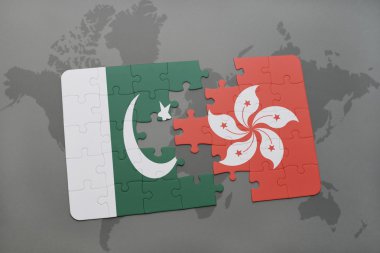 bir dünya haritası arka plan üzerinde pakistan ve hong kong ulusal bayrağı ile bulmaca.