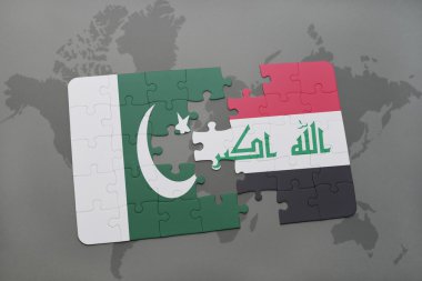 bir dünya haritası arka plan üzerinde pakistan ve Irak ulusal bayrağı ile bulmaca.