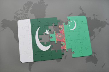 bir dünya haritası arka plan üzerinde pakistan ve türkmenistan ulusal bayrağı ile bulmaca.