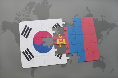 bir dünya haritası arka plan üzerinde Güney Kore ve Moğolistan ulusal bayrağı ile bulmaca.