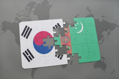 bir dünya haritası arka plan üzerinde güney kore ve türkmenistan ulusal bayrağı ile bulmaca.