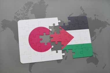 bir dünya haritası arka plan üzerinde Japonya ve Filistin ulusal bayrağı ile bulmaca.