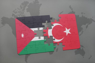 bir dünya haritası arka plan üzerinde ürdün ve Türkiye'nin ulusal bayrağı ile bulmaca.