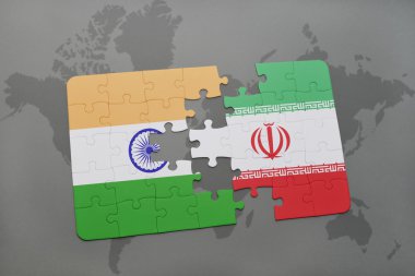 bir dünya haritası arka plan üzerinde Hindistan ve İran ulusal bayrağı ile bulmaca.