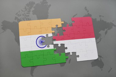 bir dünya haritası arka plan üzerinde Hindistan ve Endonezya ulusal bayrağı ile bulmaca.