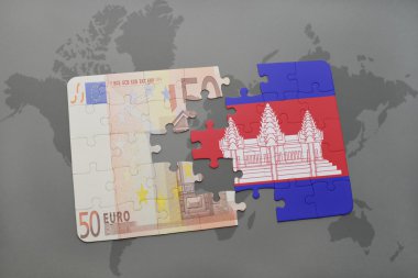 kamboçya ve bir dünya haritası arka plan üzerinde euro banknot ulusal bayrağı ile bulmaca.