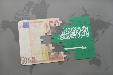 bir dünya haritası arka plan üzerinde Suudi Arabistan ve euro banknot ulusal bayrağı ile bulmaca.