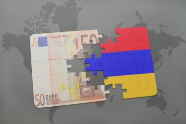bir dünya haritası arka plan üzerinde ermenistan ve euro banknot ulusal bayrağı ile bulmaca.
