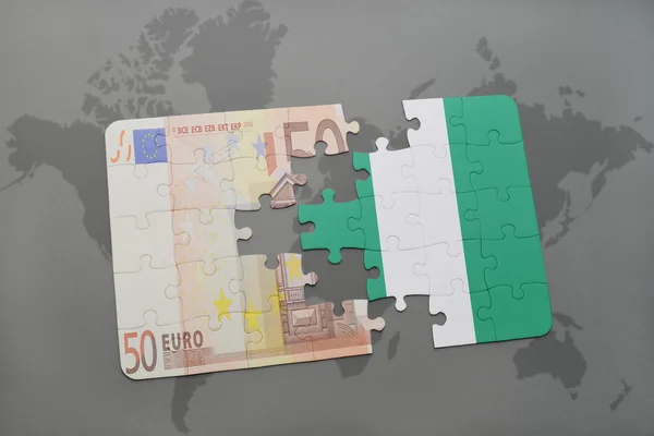 世界地图背景上与尼日利亚国旗和欧元钞票的拼图. — 图库照片