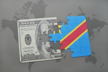 kongo demokratik cumhuriyeti nin ulusal bayrağı ve bir dünya haritası arka plan üzerinde dolar banknot ile bulmaca.