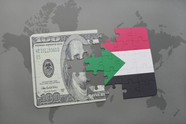 sudan ve Doları banknot dünya harita arka plan üzerinde bayrağı ile bulmaca.