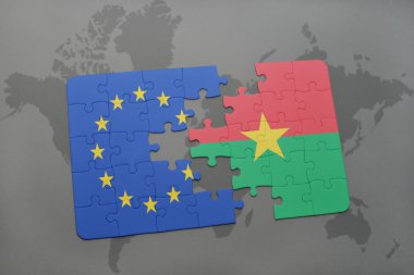 bir dünya haritası arka plan üzerinde Avrupa Birliği ve burkina faso ulusal bayrağı ile bulmaca.